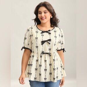 BloomChic Cream Blouse with Black Bow Print